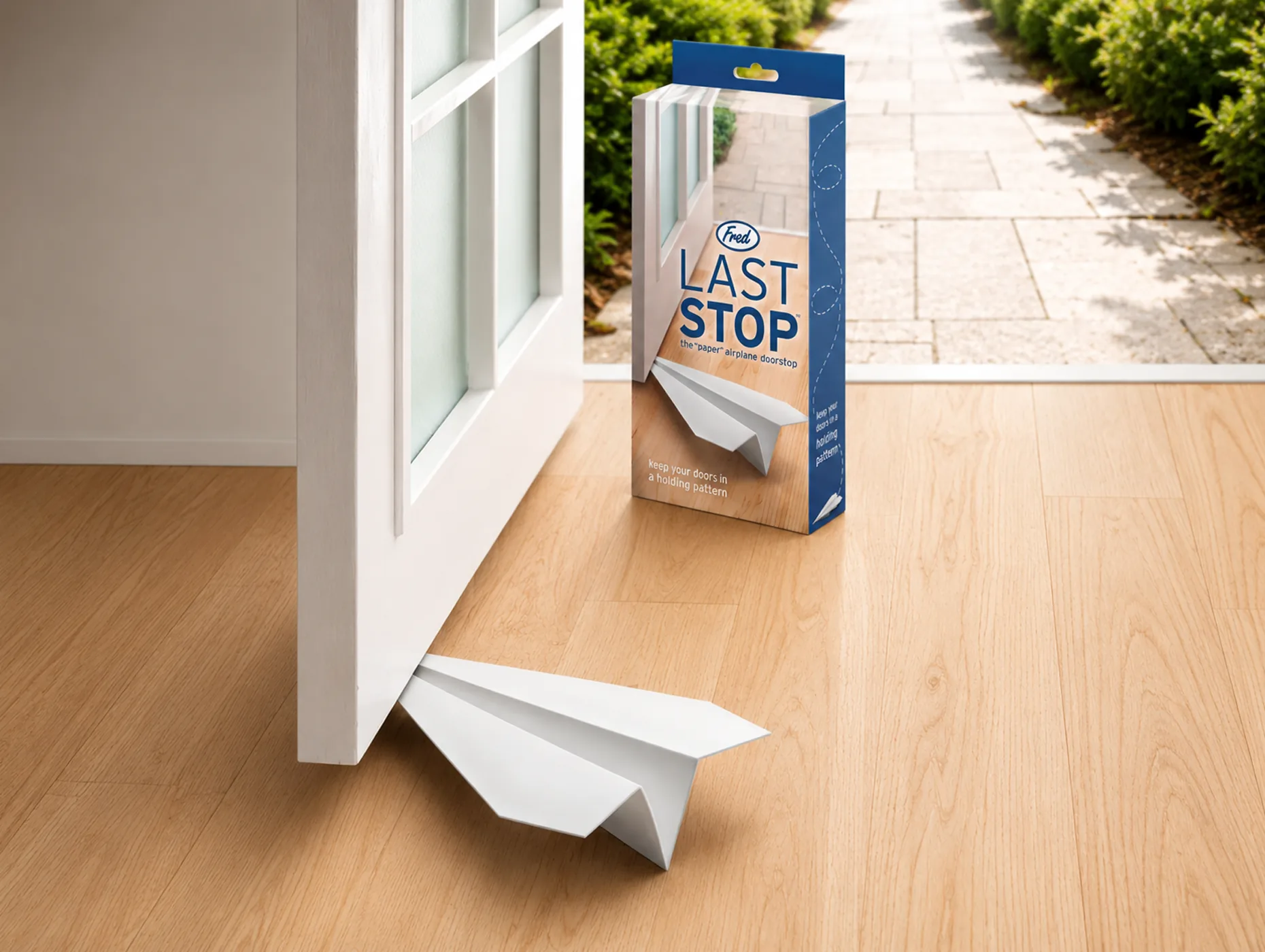 Last Stop — paper plane doorstop, Fred & Friends